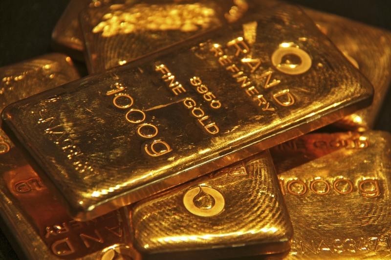 Gold costs slide from close to record highs as securities exchanges bounce back